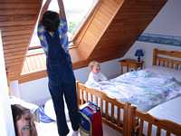 Making the beds in the 3rd floor 'girls' room