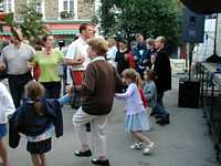 Juli dancing a line dance with a very patient lady