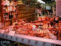A small display of 'We have cut it for you already' meats just down the street
