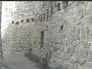 Stone wall--the beam holes show where the ceiling would be