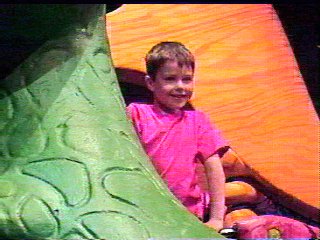 You slide down Rex's back