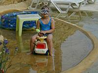 Juli playing at the pool.