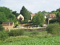Some of the cottages of Les Maurelles with the pool and snack bar in the forground.