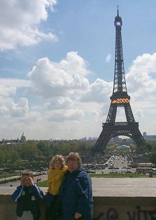 Mom and the children by the tower