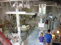 The *egg* is then carved and polished in a dusty work shop