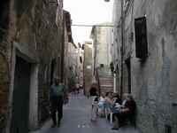 Enjoying a chat on one of the wider streets in town